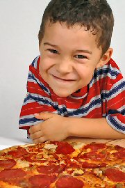 Young Boy With Pizza